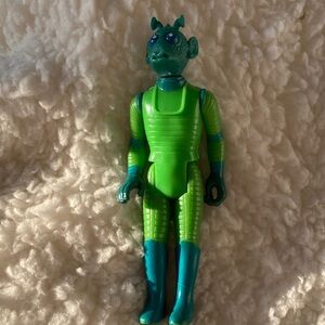 Green and Blue Alien Action Figure